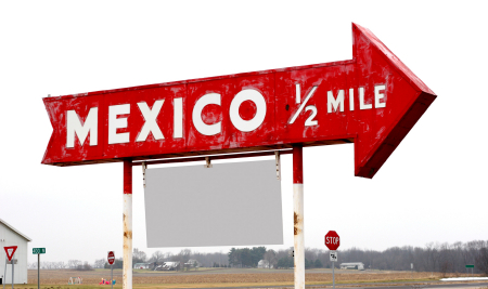 Mexico 1/2 Mile sign.